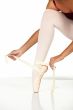 Tying ballet shoes
