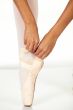 Tying ballet shoes