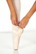 Tying ballet shoes