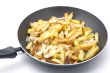 fried cutting potatoes in griddle closeup
