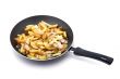 fried cutting potatoes in griddle on white