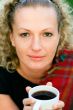 woman holding a cup