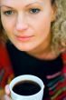 woman holding a cup