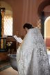 Priest with Bible