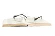 Glasses with book on white background