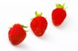 Strawberries isolated over white background