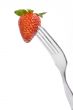 fork and fresh strawberry
