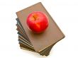 apple near the books