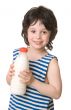 The boy with a bottle of milk
