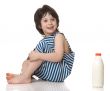 The boy with a bottle of milk