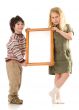 The boy and girl with a frame