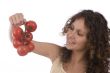 Woman with  tomato.