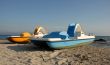 two pedalos on a beach