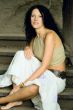 attractive woman sitting on wooden stairs