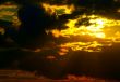 Sun behind storm-cloud