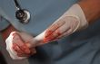 Abstract of Doctors Bloody Surgical Gloves