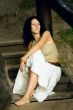 attractive woman on wooden stairs