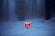 wrong way sign in snow