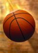 Basketball ball on dark yellow background