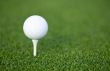 golf ball on the green grass