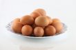 Eggs in a bowl on a white background