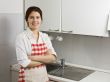 Woman alone in the kitchen