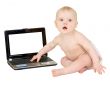 Baby with the laptop isolated on white