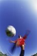 Soccer Player Kicking the Ball