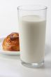 glass with milk and bun