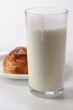 glass with milk and bun