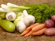 fresh tasty vegetables on brown background