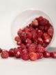 wild strawberry in glass over the table