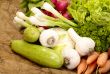 fresh tasty vegetables on brown background