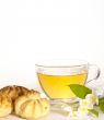 breakfast still-life. green tea with cookies and fresh jasmine