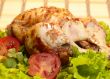 grilled chicken, whole with vegetables on salad leafs