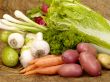 fresh tasty vegetables on brown background