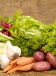 fresh tasty vegetables on brown background