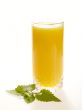Orange juice on the table with fresh mint
