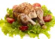 grilled chicken whole with vegetables on salad leafs