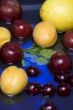 fruit on blue water closeup