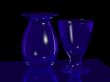 blue glass vase and goblet