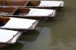 Snow-covered punts in Cambridge