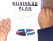 man presents business plan