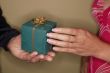 gift giving. Couple hands