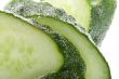 Cutting cucumber in water macro