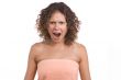 A woman screaming with crazy expression.