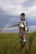 medieval knight in the field, and a rainbow