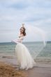 beautiful bride  dancing on the beach