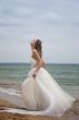 beautiful bride  dancing on the beach