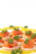 Smoked salmon and cream cheese on crackers